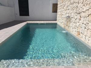 The swimming pool at or close to Cas Conco
