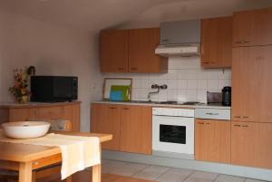 Kuchyň nebo kuchyňský kout v ubytování Ferienwohnung Piontek