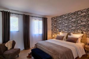 Giường trong phòng chung tại gîte romantique