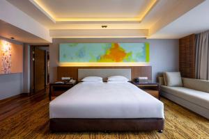 Krevet ili kreveti u jedinici u okviru objekta Hyatt Regency Kinabalu