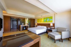 Krevet ili kreveti u jedinici u okviru objekta Hyatt Regency Kinabalu