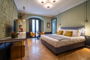 Voodi või voodid majutusasutuse Case Ospitali, KS-Suites toas