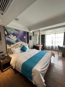Xizha River View Homestay客房内的一张或多张床位
