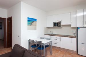 Kuchnia lub aneks kuchenny w obiekcie Villas & Apartamentos Tao Mazo
