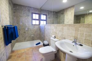 Łazienka w obiekcie Villas & Apartamentos Tao Mazo