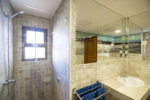 Łazienka w obiekcie Villas & Apartamentos Tao Mazo