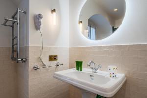 Vannituba majutusasutuses Case Ospitali, KS-Suites