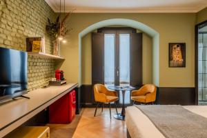 Posezení v ubytování Case Ospitali, KS-Suites
