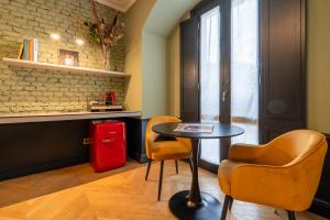 Köök või kööginurk majutusasutuses Case Ospitali, KS-Suites