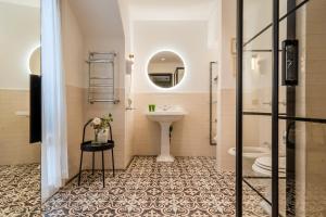 Vannituba majutusasutuses Case Ospitali, KS-Suites
