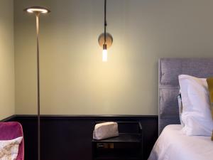 Voodi või voodid majutusasutuse Case Ospitali, KS-Suites toas