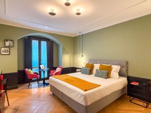 Voodi või voodid majutusasutuse Case Ospitali, KS-Suites toas