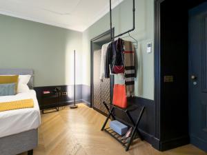 Voodi või voodid majutusasutuse Case Ospitali, KS-Suites toas