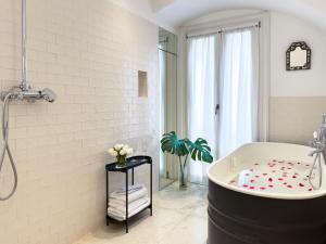 Vannituba majutusasutuses Case Ospitali, KS-Suites