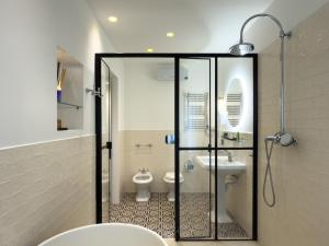 Vannituba majutusasutuses Case Ospitali, KS-Suites