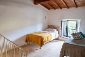 Letto o letti in una camera di Podere del Pari