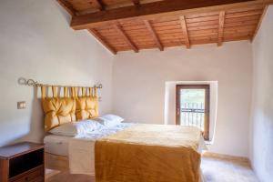 Letto o letti in una camera di Podere del Pari