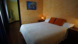 Posteľ alebo postele v izbe v ubytovaní Hotel Tikar