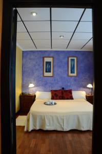 Posteľ alebo postele v izbe v ubytovaní Hotel Tikar