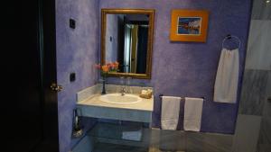 Kúpeľňa v ubytovaní Hotel Tikar