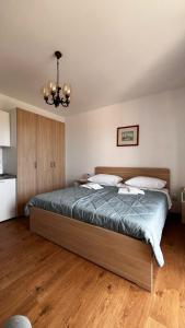 Posteľ alebo postele v izbe v ubytovaní Apartment Zana + 12 fotografií