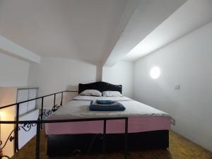 Postel nebo postele na pokoji v ubytování DM Hostel and Apartments