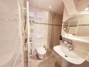 Koupelna v ubytování Hotel Villa Meeresgruss + 37 fotografií