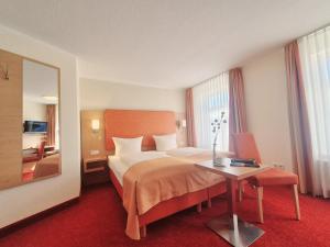 Postel nebo postele na pokoji v ubytování Hotel Villa Meeresgruss