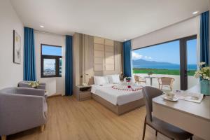 Postel nebo postele na pokoji v ubytování ELC Da Nang Hotel + 37 fotografií