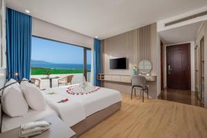 TV a/nebo společenská místnost v ubytování ELC Da Nang Hotel
