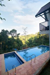 Bazén v ubytování Gardenia Munnar nebo v jeho okolí