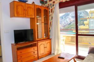 Telewizja i/lub zestaw kina domowego w obiekcie Apartamentos Topacio Unitursa
