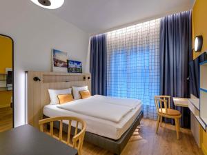 Postel nebo postele na pokoji v ubytování Aparthotel Adagio Access Kiel City