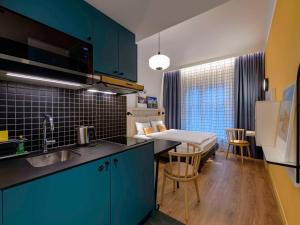 Kuchyň nebo kuchyňský kout v ubytování Aparthotel Adagio Access Kiel City