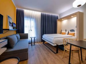 Postel nebo postele na pokoji v ubytování Aparthotel Adagio Access Kiel City