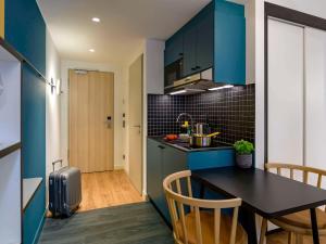 Kuchyň nebo kuchyňský kout v ubytování Aparthotel Adagio Access Kiel City