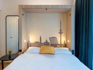 Postel nebo postele na pokoji v ubytování Aparthotel Adagio Access Kiel City