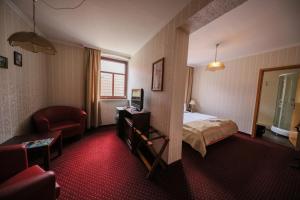 Postel nebo postele na pokoji v ubytování Hotel Zur Traube