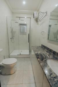 Koupelna v ubytování George Residence Kaura Abuja