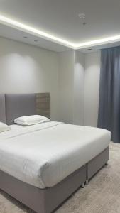 Postel nebo postele na pokoji v ubytování قمم النماص 2 Qimam alnamas