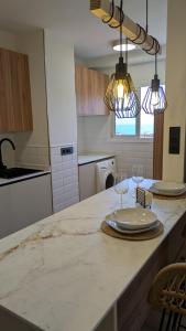 Kuchyňa alebo kuchynka v ubytovaní Apartamento Nuevo al lado de la Playa