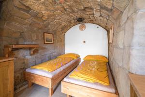 Postel nebo postele na pokoji v ubytování Miniresort AMULET