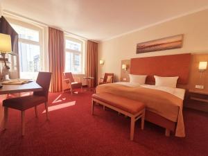 Postel nebo postele na pokoji v ubytování Hotel Villa Meeresgruss