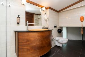 a bathroom with a sink and a toilet at Hotel Bistrik City Center in Sarajevo +76 photos