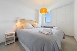 Postel nebo postele na pokoji v ubytování Hauzify I Apartament Torremunts
