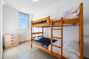 Postel nebo postele na pokoji v ubytování Hauzify I Apartament Torremunts