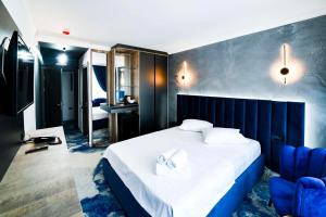 Postel nebo postele na pokoji v ubytování HOTEL TOPAZ 4* CAP AURORA