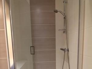 Koupelna v ubytování Appartement Les Glycines + 18 fotografií