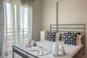 Ένα ή περισσότερα κρεβάτια σε δωμάτιο στο Alisahni Home 1