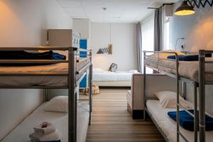 Postel nebo postele na pokoji v ubytování Hôtel Le Grand Barnum